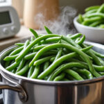 découvrez le temps de cuisson des haricots verts frais à la cocotte-minute et nos astuces pour les garder tendres, savoureux et bien verts.